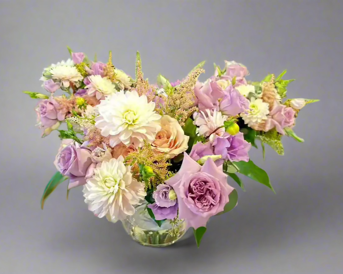 Bouquet of flowers on a grey color background.