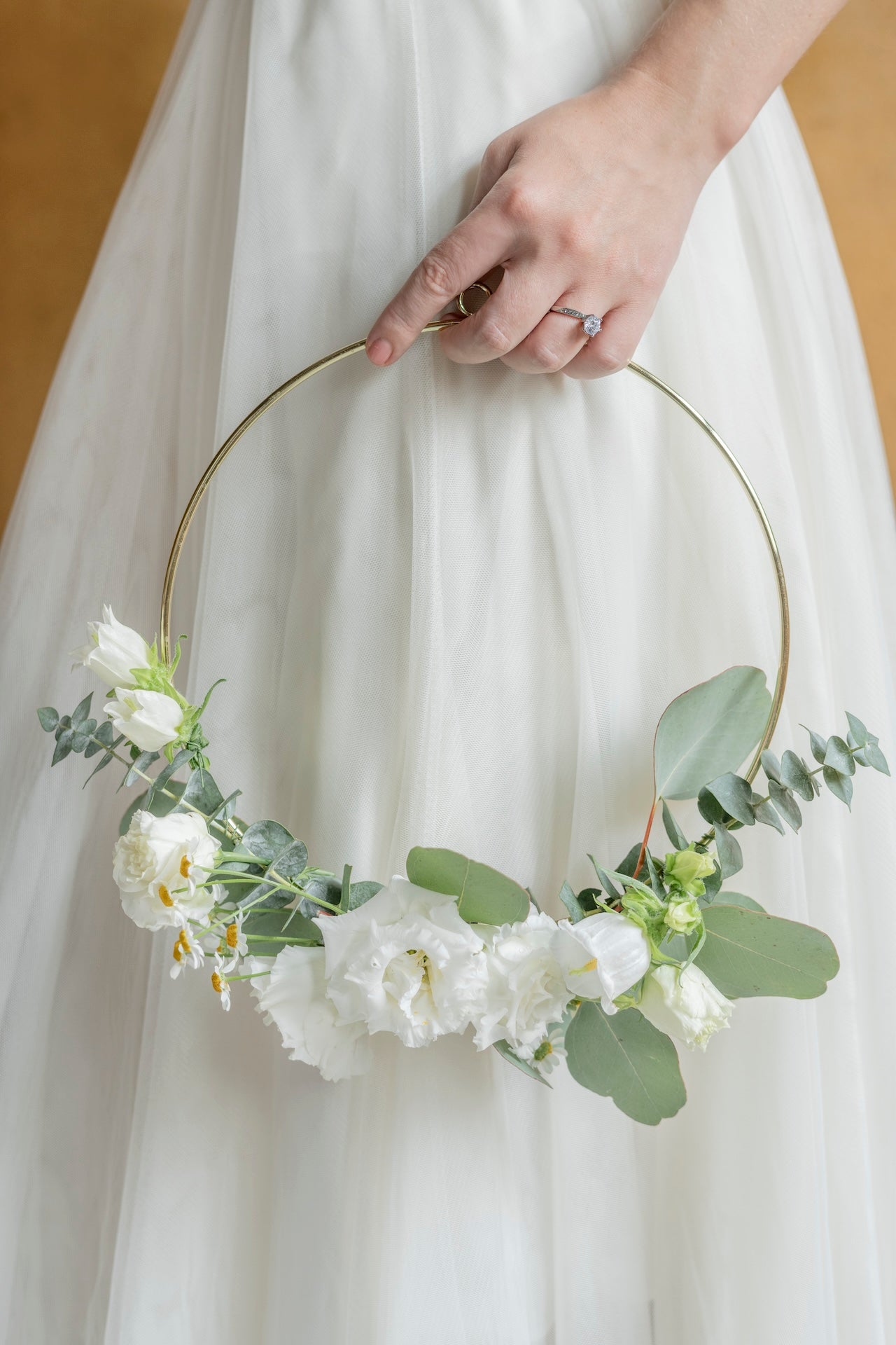 vancouver-bc-Wedding-gril-holding-a-flower-decorated-golden-ring