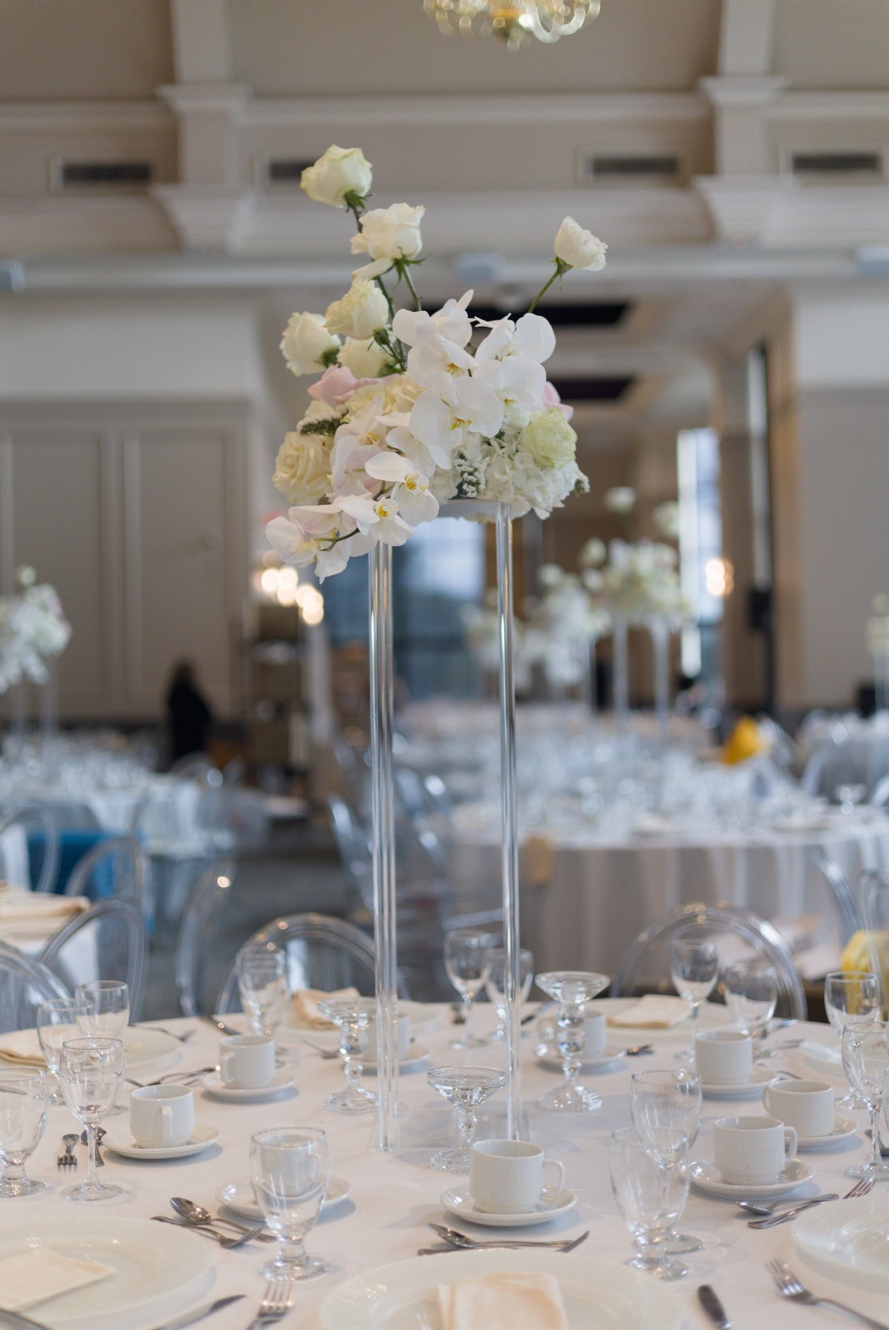 Decorative floral centerpiece on a table in at Swaneset Bay Resort & Country Club grand ball room.